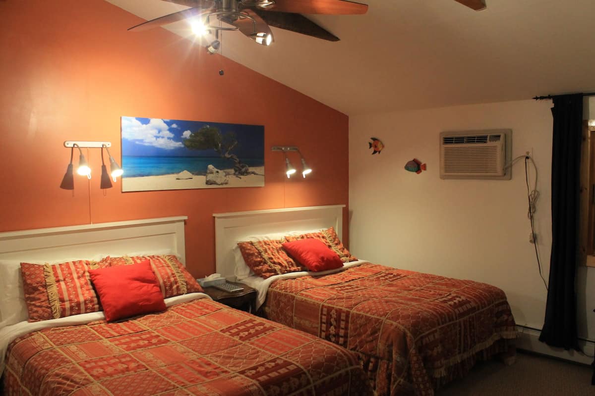 Ropa de cama de alta calidad y tabla de planchar con plancha