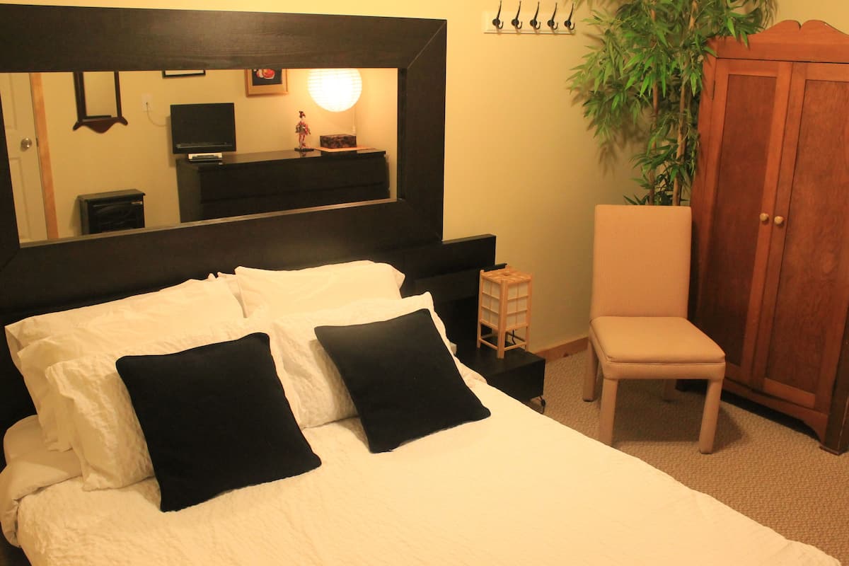 Ropa de cama de alta calidad y tabla de planchar con plancha