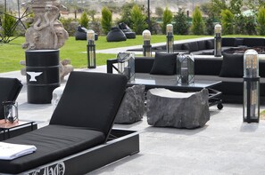 Outdoor pool, open 10:00 AM to 9:00 PM, pool umbrellas, pool loungers