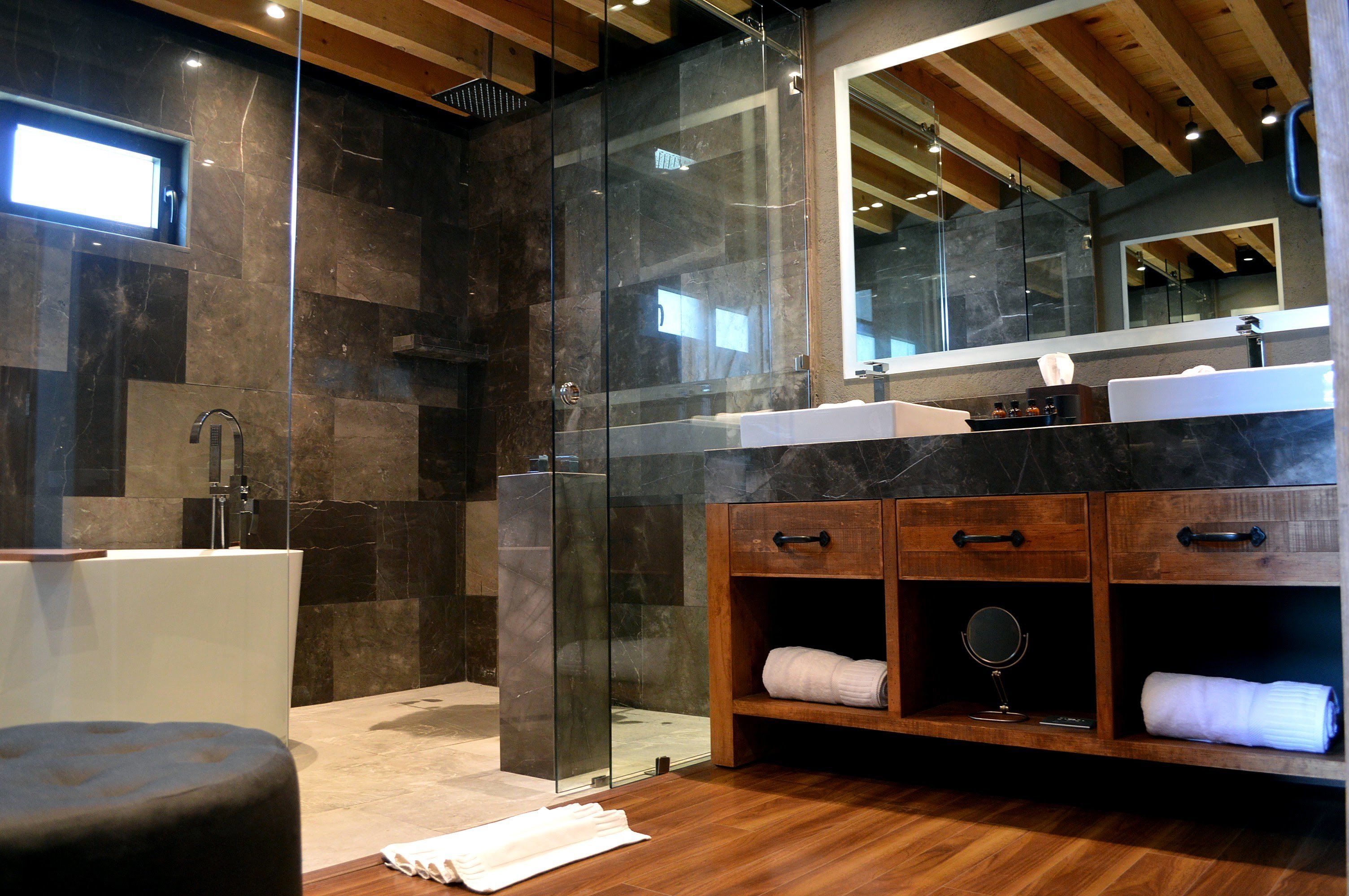 grand chalet, 1 king bed | bathroom | shower, rainfall showerhead, free toiletries, hair dryer