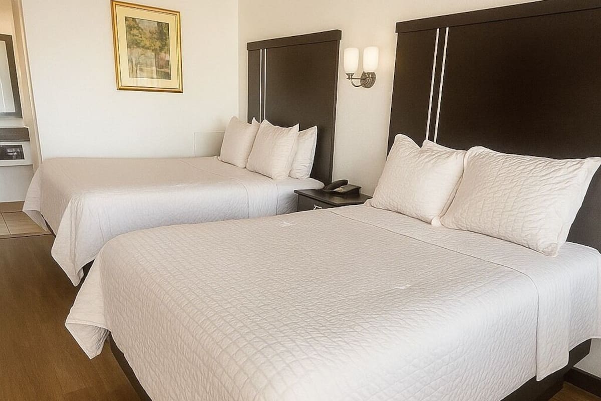 Standard Room, 2 Queen Beds, Non Smoking | Desk, iron/ironing board, free WiFi, bed sheets