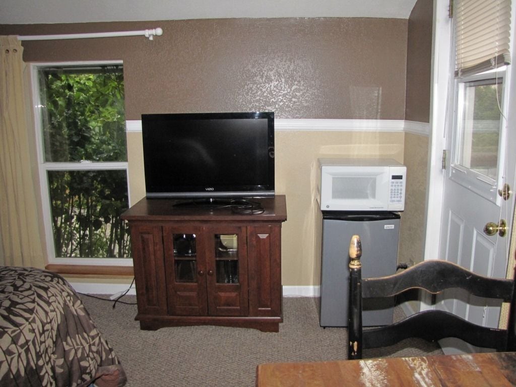 premium studio suite, 1 king bed, refrigerator & microwave | mini fridge