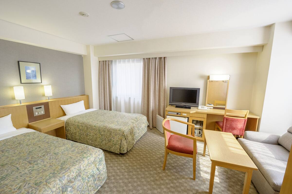 Desk, blackout drapes, WiFi (free), bed sheets