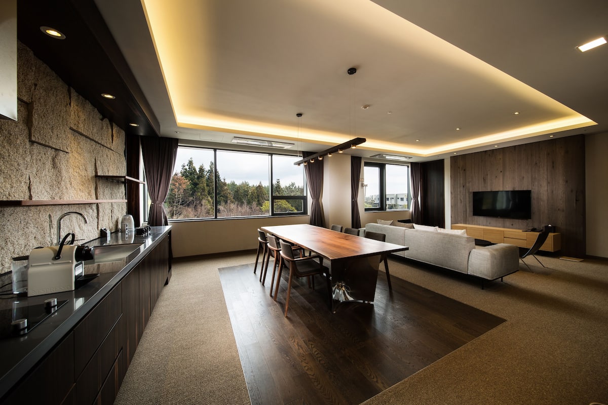 Suite (A) | Living room | 50-inch LCD TV with cable channels, TV, pay movies