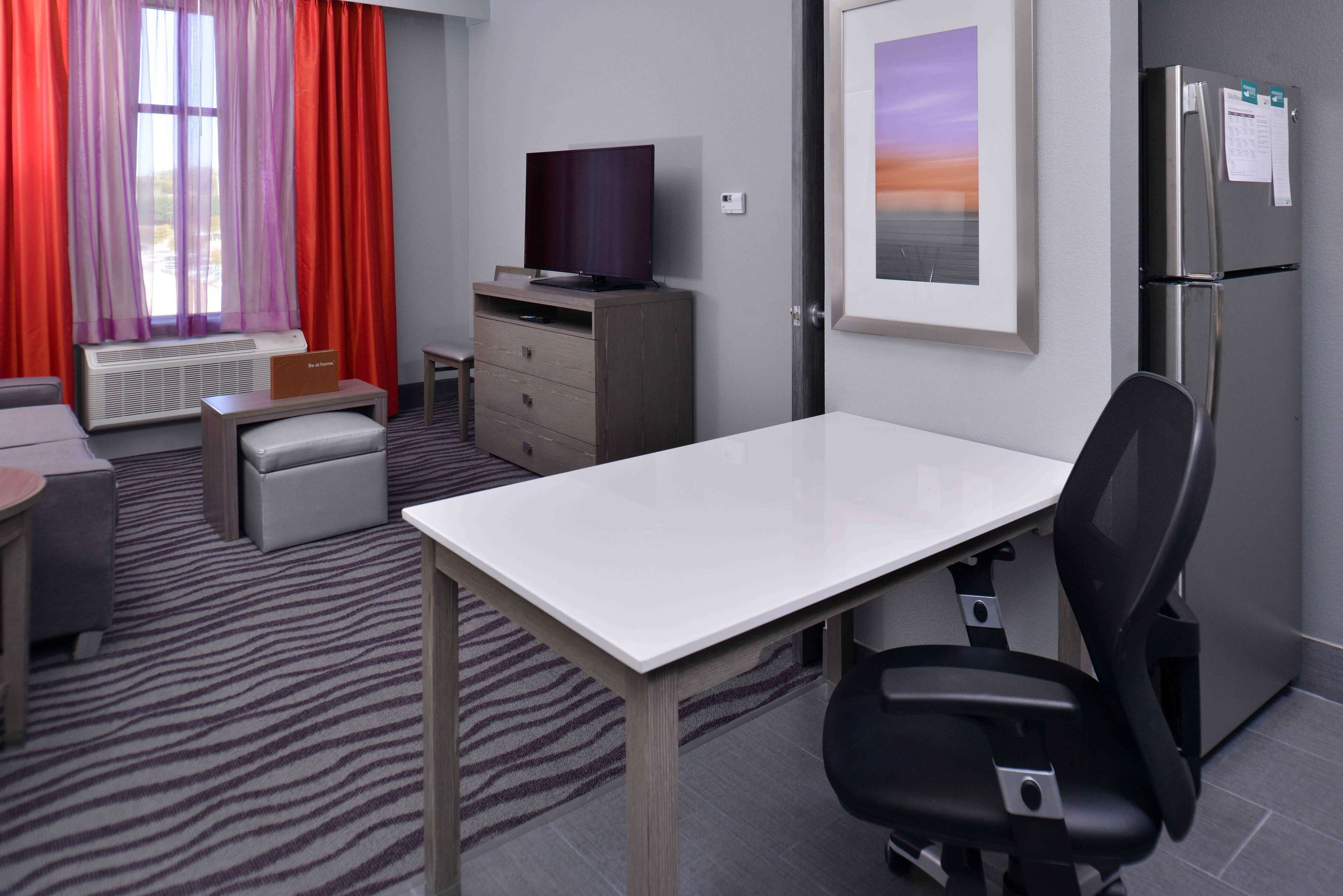 full-sized fridge, microwave, stovetop, dishwasher