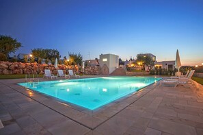 Seasonal outdoor pool, pool umbrellas, pool loungers