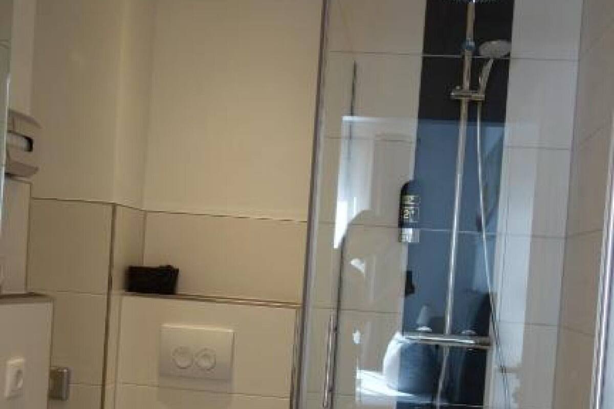 comfort double room, 1 queen bed, non smoking | bathroom | shower, rainfall showerhead, hair dryer, towels