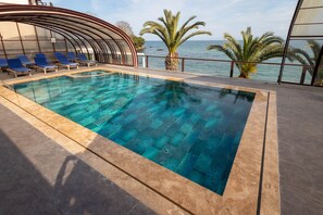 Outdoor pool, open 7:00 AM to 7:00 PM, free pool cabanas, pool loungers