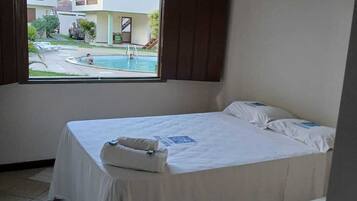 Quarto quádruplo standard | Frigobar, individualmente decorados, cortinas blackout