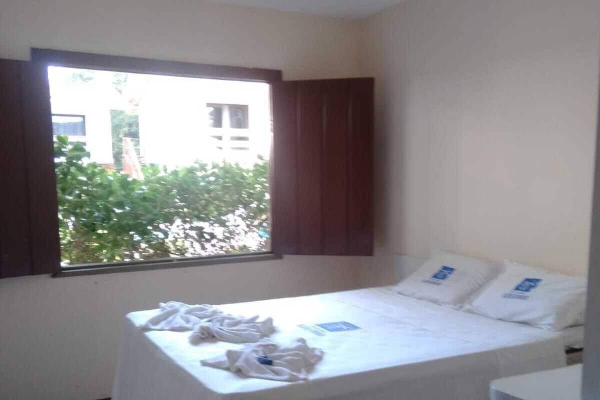 Standard Quadruple Room | Minibar, individually decorated, blackout curtains, iron/ironing board