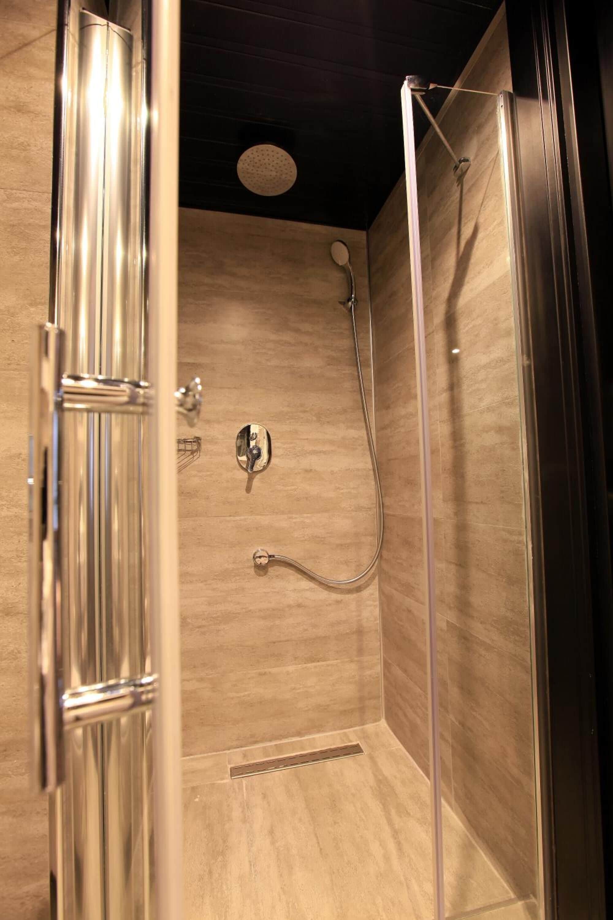 shower, free toiletries, hair dryer, slippers