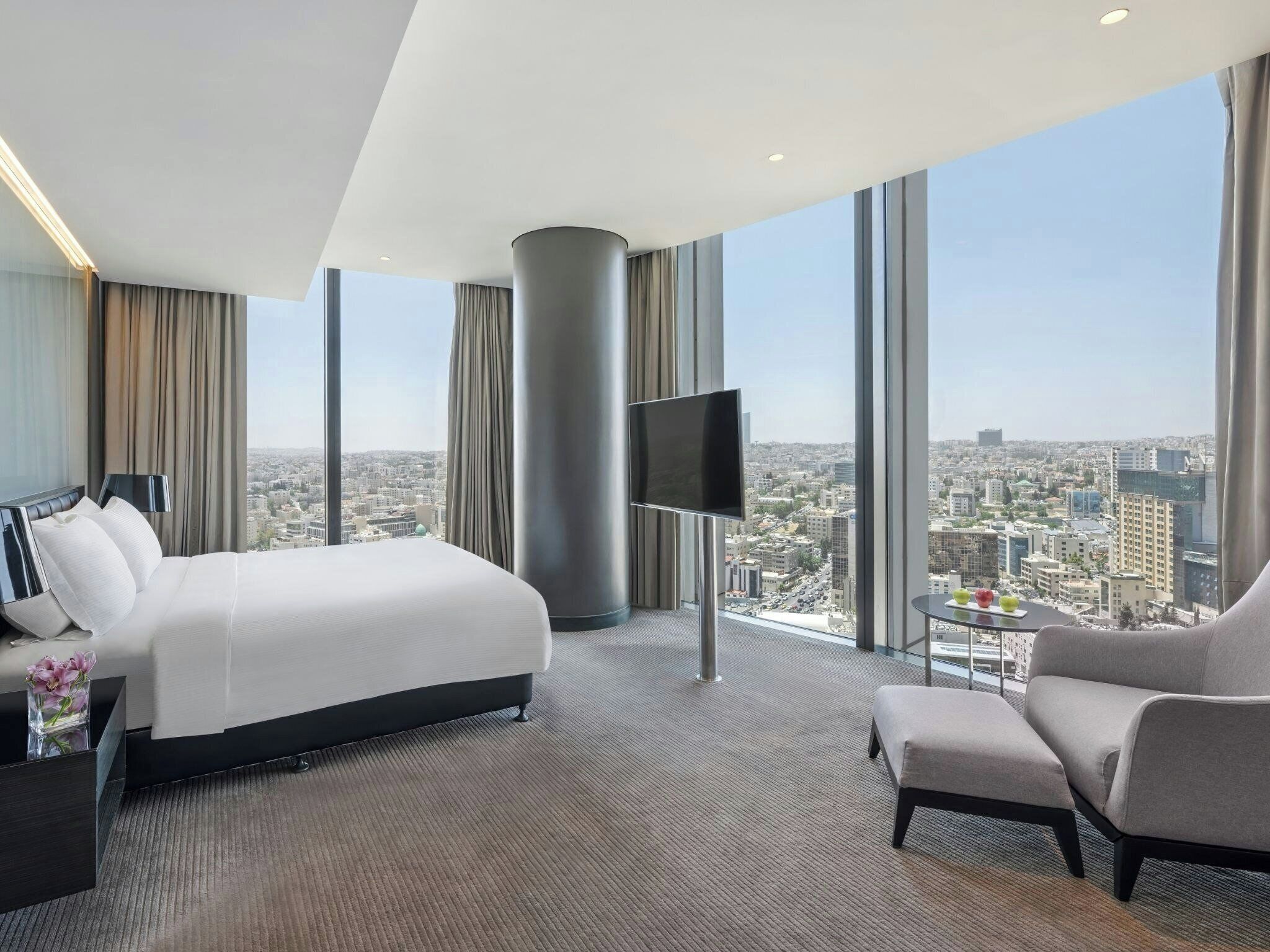 Room, 1 King Bed, City View, Corner | Down comforters, in-room safe, desk, laptop workspace