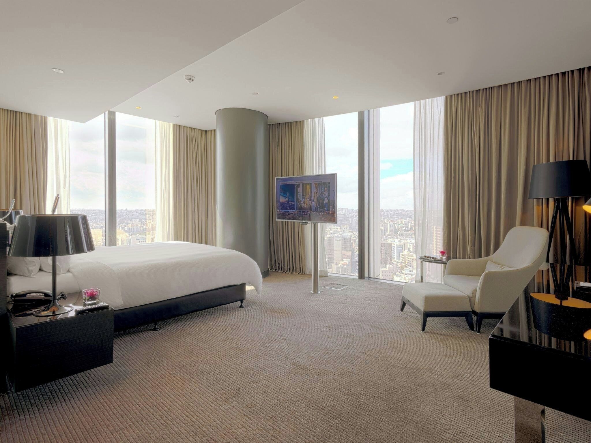 Room, 1 King Bed, City View, Corner (High Floor) | Down comforters, in-room safe, desk, laptop workspace