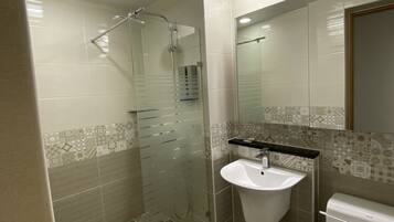 Shower, free toiletries, hair dryer, towels