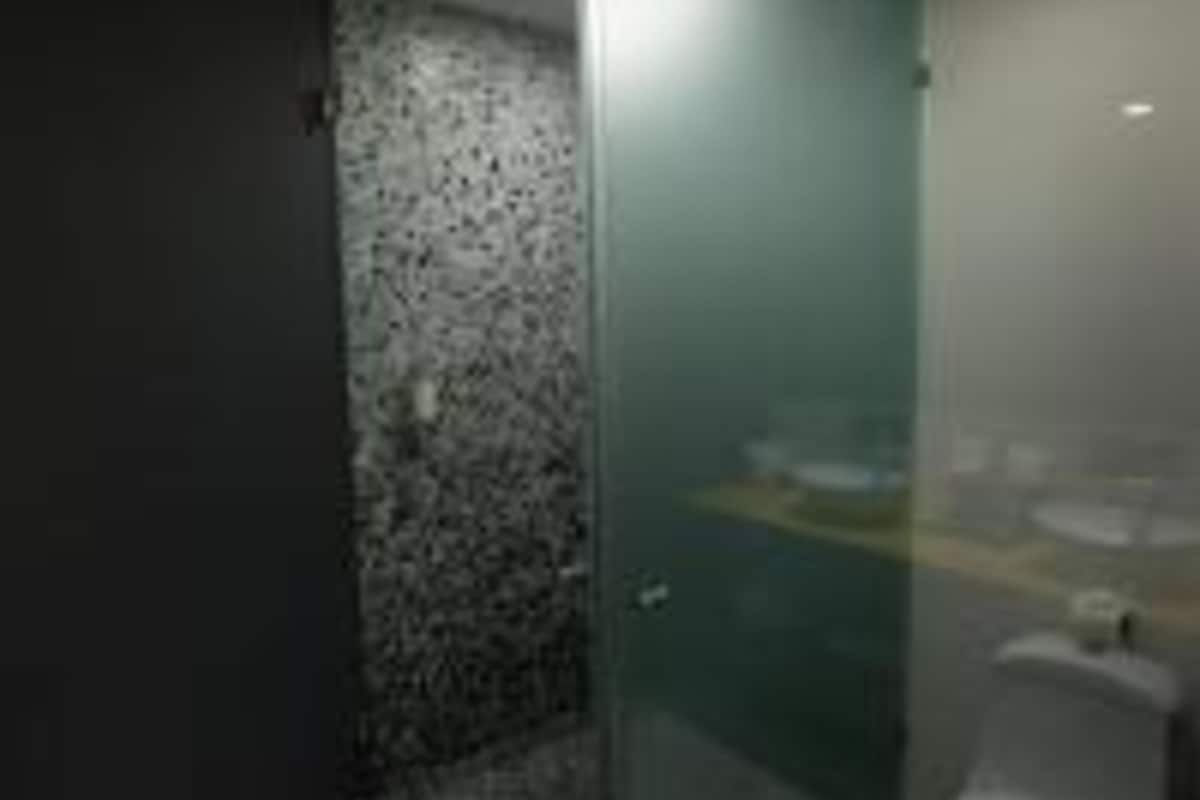 master suite 1 king bed and 2 double bed | bathroom | shower, rainfall showerhead, free toiletries, hair dryer