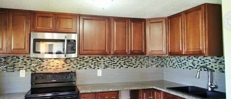 Suite familiar, 2 camas matrimoniales | Cocina privada | Refrigerador y microondas