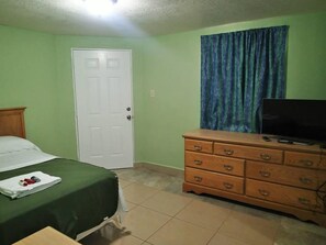 Desk, blackout drapes, soundproofing, free WiFi
