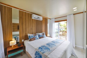 Bangalô | 1 habitación, minibar y caja de seguridad en la habitación