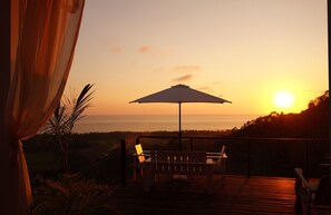 Panorama cottage, 1 kingsize bed, uitzicht op zee, aan zee | Woonruimte