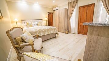 Princess Court | Minibar, in-room safe, desk, iron/ironing board