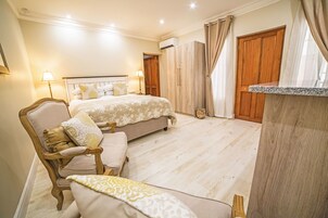 Princess Court | Minibar, in-room safe, desk, iron/ironing board