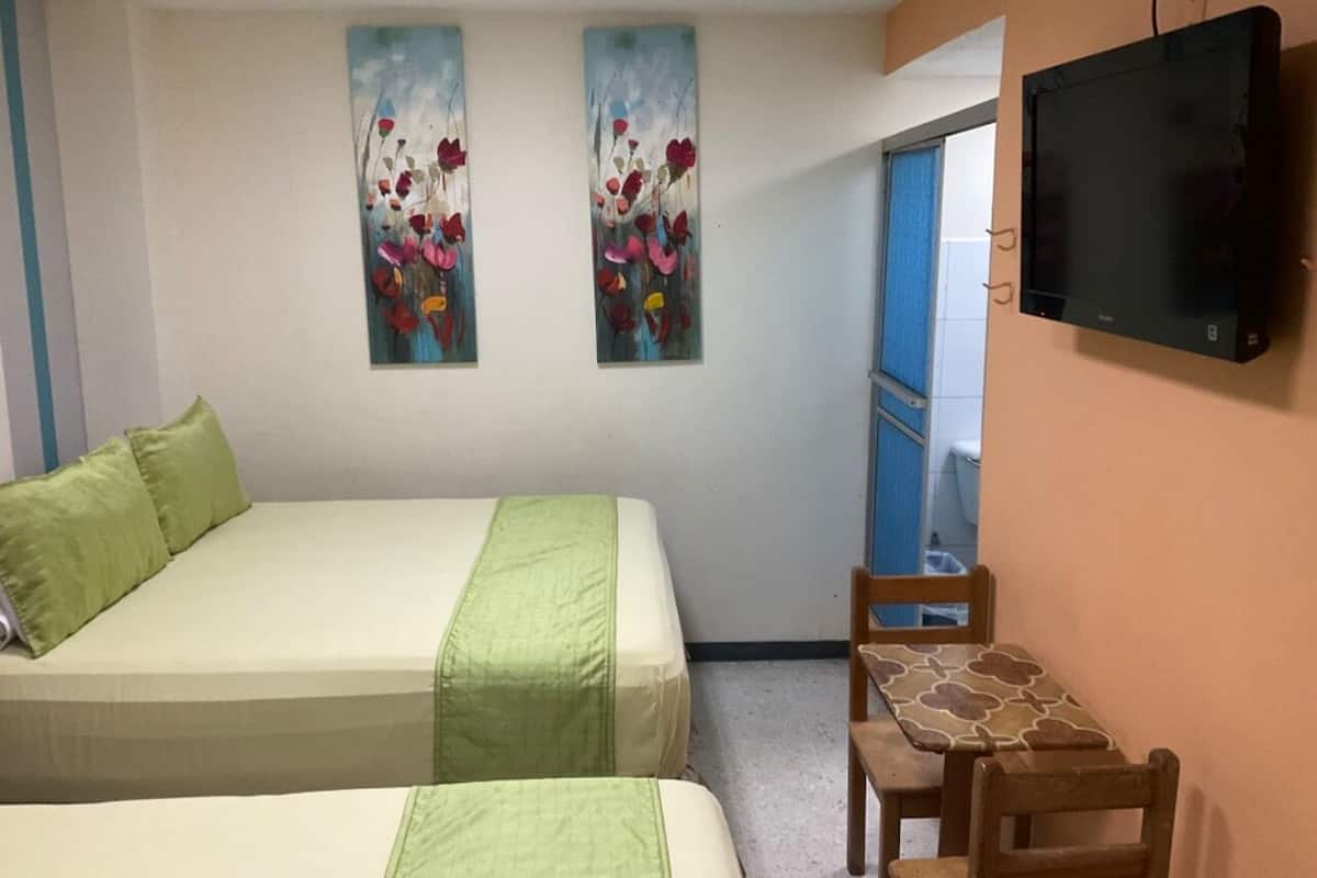 standard double room, 2 queen beds | iron/ironing board, rollaway beds, free wifi, bed sheets