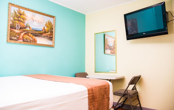 Standard Room, 1 Queen Bed | Iron/ironing board, rollaway beds, free WiFi, bed sheets