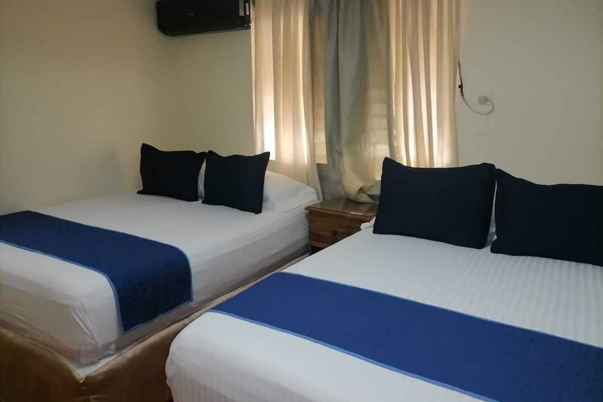 standard double room, 2 queen beds | iron/ironing board, rollaway beds, free wifi, bed sheets