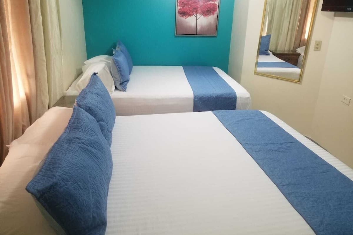 standard double room, 2 queen beds | iron/ironing board, rollaway beds, free wifi, bed sheets