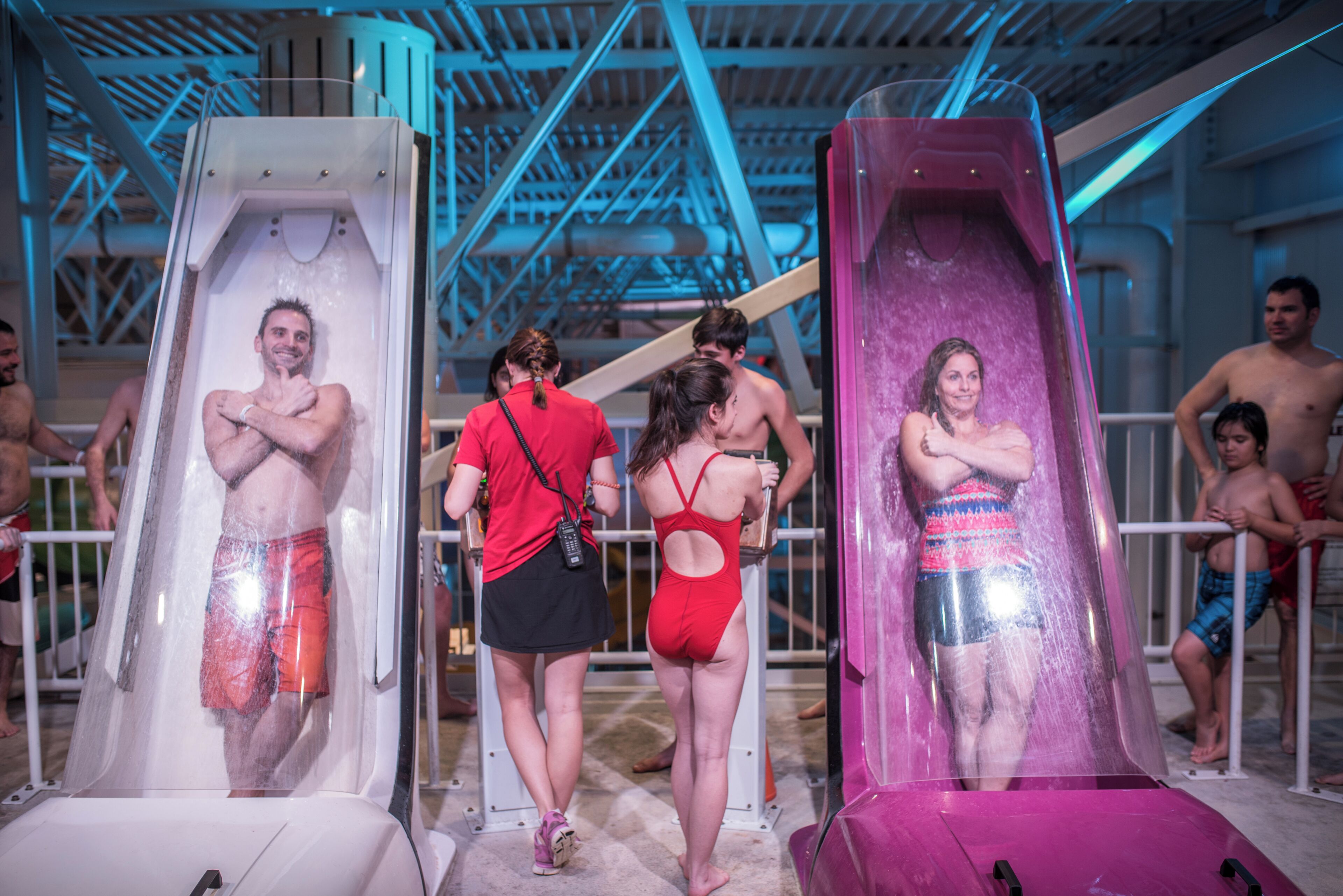 A water slide with people using it.