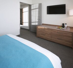Suite King avec vue sur le parc extérieur, 1 Lit King et 1 Lit Queen escamotable | Coffre-fort, système d’insonorisation, fer et planche à repasser