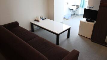 Basic Triple Room, 3 Twin Beds, Non Smoking | Living area | LCD TV