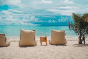 On the beach, white sand, free beach cabanas, sun loungers - Amihan Beach Cabanas (Santa Fe)
