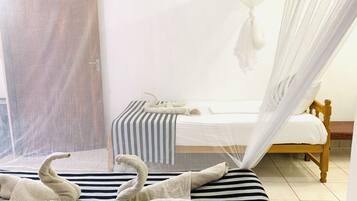 Deluxe Triple Room, 1 Bedroom, Garden View | 6 bedrooms, in-room safe, desk, soundproofing