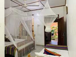 Standard Triple Room, 1 Bedroom, Garden View | 6 bedrooms, in-room safe, desk, soundproofing