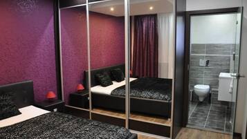 Apartamento superluxo, 1 cama King e sofá-cama | Escrivaninha, quartos à prova de som, Wi-Fi de cortesia