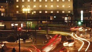 A building with the sign "Fine Days Hotel" at night. - Finedays Hotel (Ina)