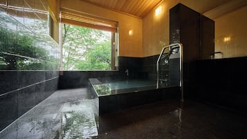 Executive Sakura Japanese-Western Quad Room | Bathroom | Combined shower/tub, spring water tub, free toiletries, hair dryer