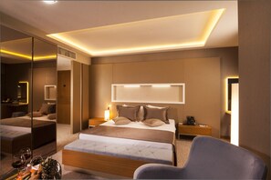 Superior Room | Minibar, in-room safe, iron/ironing board, free cribs/infant beds