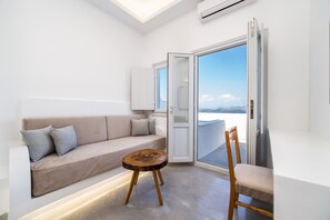 Premium Suite, Hot Tub (Caldera View) | Living area | Flat-screen TV - Serenità Luxury Suites (Santorini)