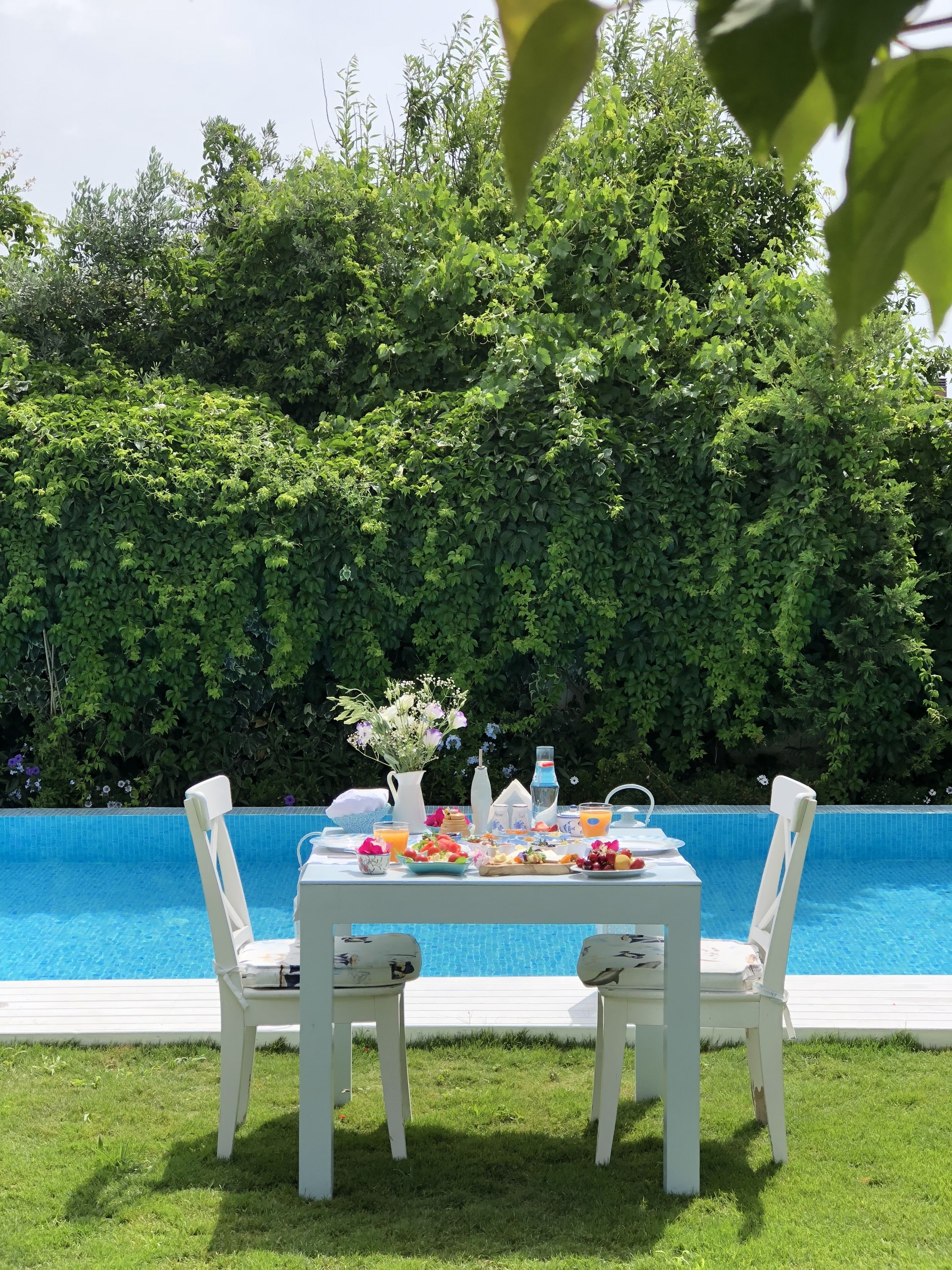 seasonal outdoor pool, pool umbrellas, pool loungers