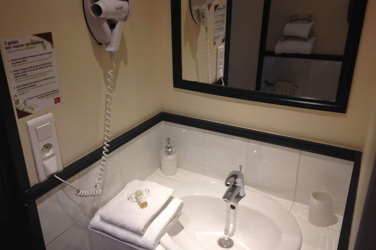 superior single room | bathroom | rainfall showerhead, free toiletries, hair dryer, towels
