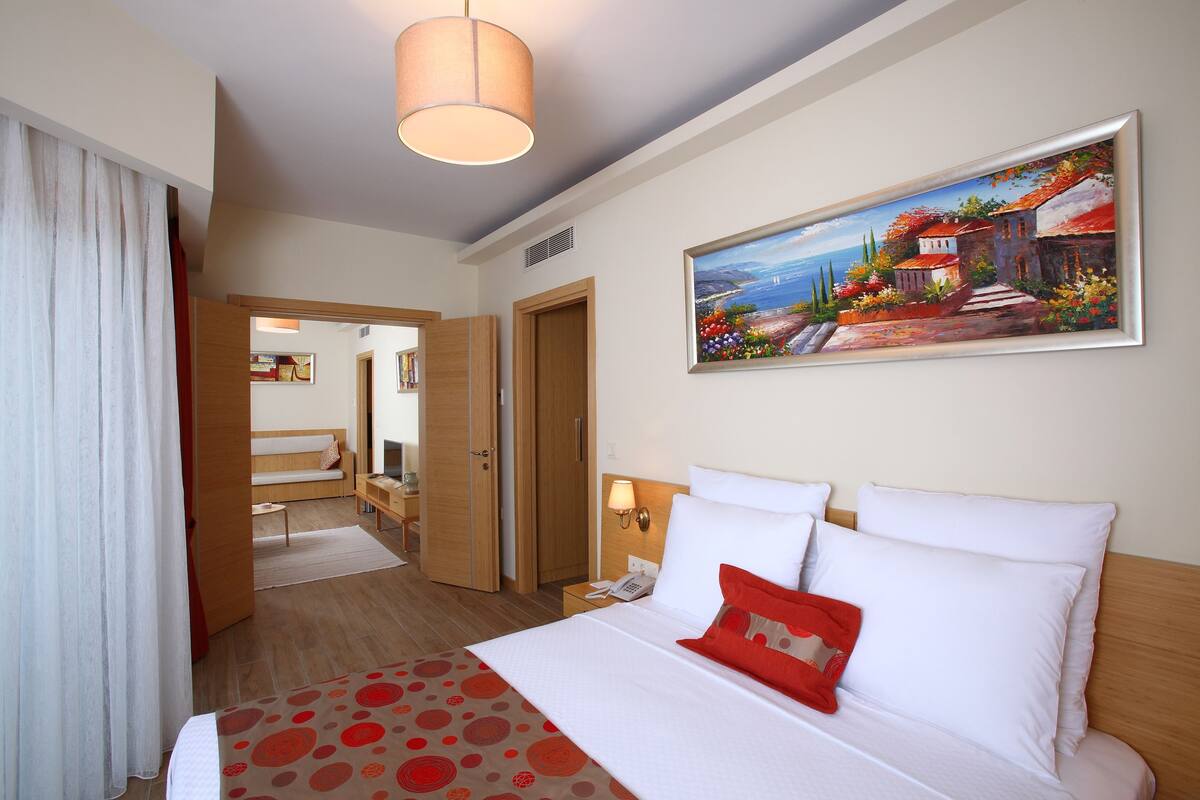 family suite, 2 bedrooms, courtyard view | 1 bedroom, premium bedding, minibar, in-room safe