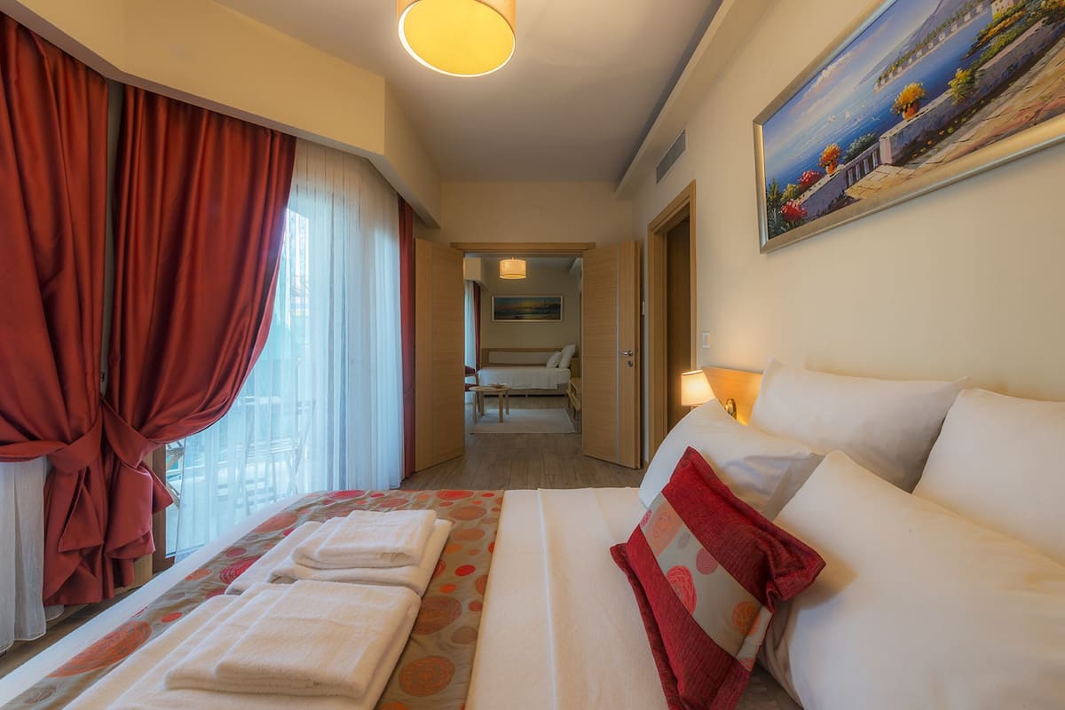family suite, 2 bedrooms, courtyard view | 1 bedroom, premium bedding, minibar, in-room safe