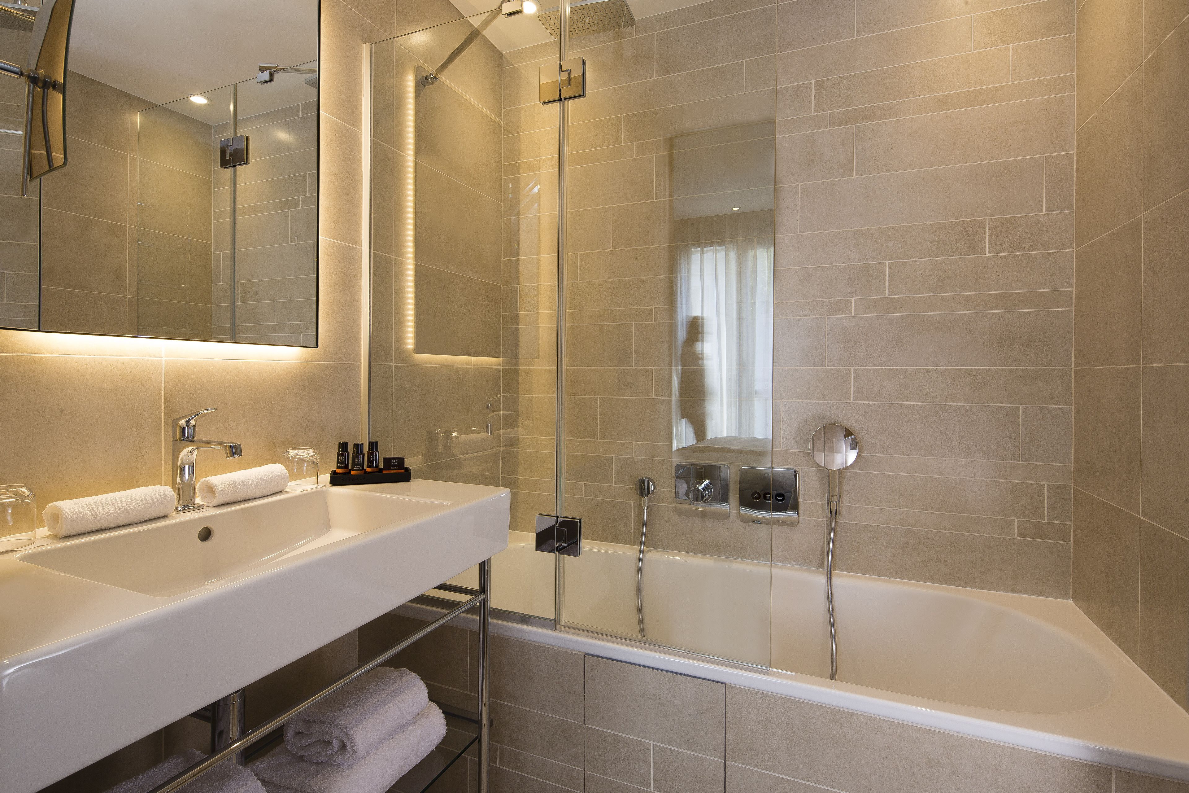 deluxe double room | bathroom | shower, free toiletries, hair dryer, towels