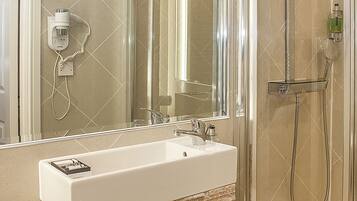 Shower, free toiletries, hair dryer, slippers