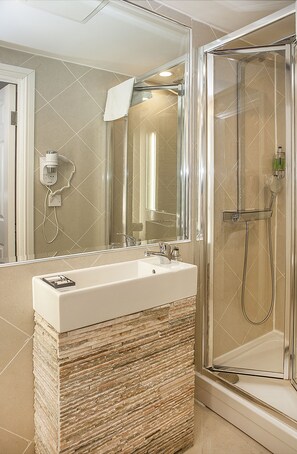 Shower, free toiletries, hair dryer, slippers