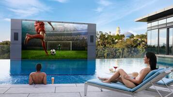 Outdoor pool, open 7:00 AM to 7:00 PM, free cabanas, pool umbrellas