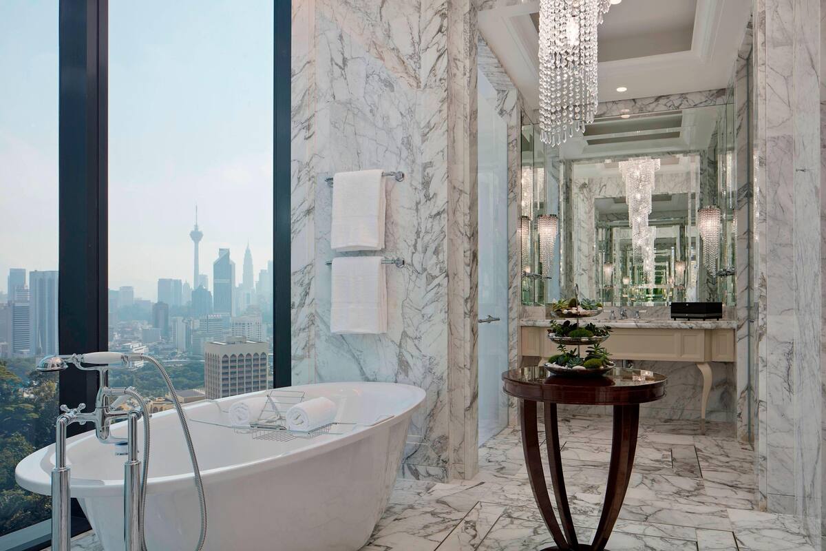 separate bathtub and shower, deep-soaking bathtub, rainfall showerhead