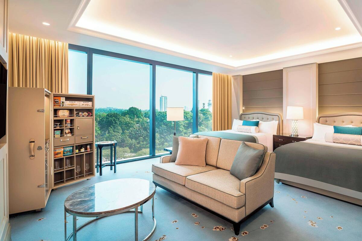 Pillow-top beds, free minibar items, in-room safe, desk